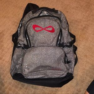 Nfinity sparkle backpack black grey with red symb